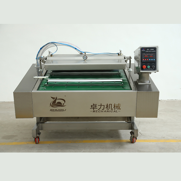 滾動式真空包裝機(jī) 滾動式真空包裝機(jī)