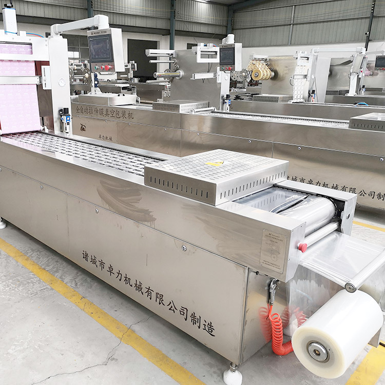 拉伸膜真空包裝機(jī) 拉伸膜真空包裝機(jī)